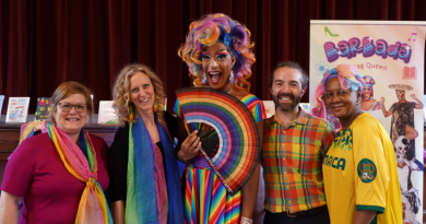 Library staff with Barbada de Barbades for Drag Storytime