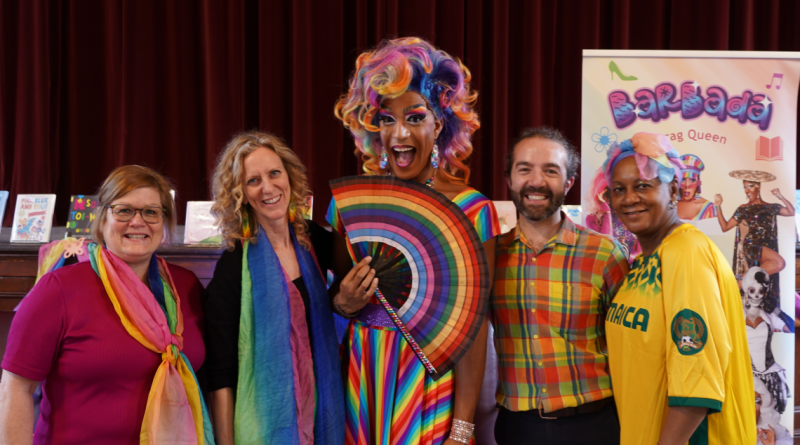 Library staff with Barbada de Barbades for Drag Storytime
